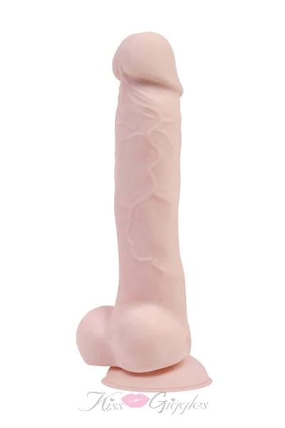 Suction mounted realistic looking strap-on true feel cock